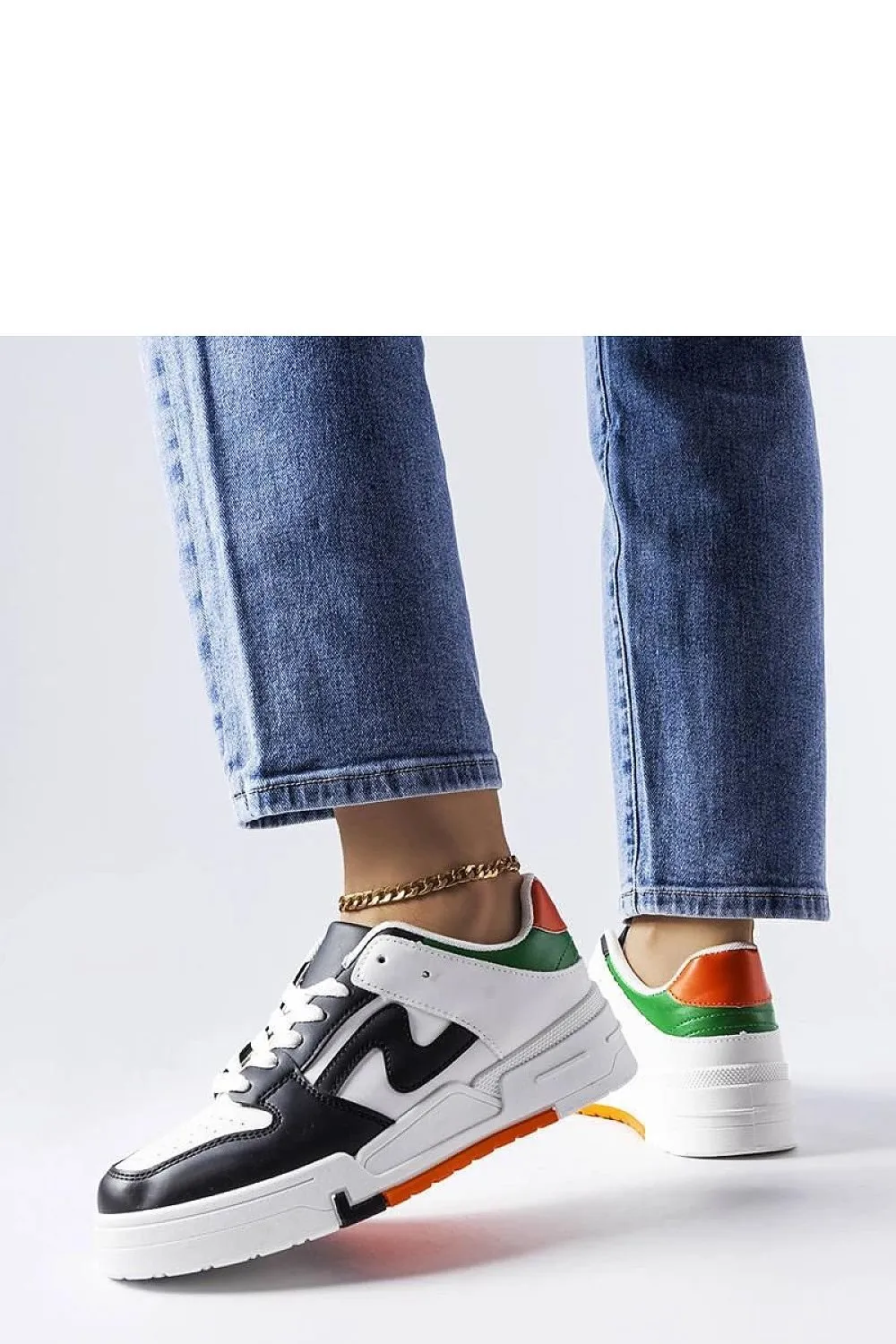 Black and white sneakers with a thicker sole
