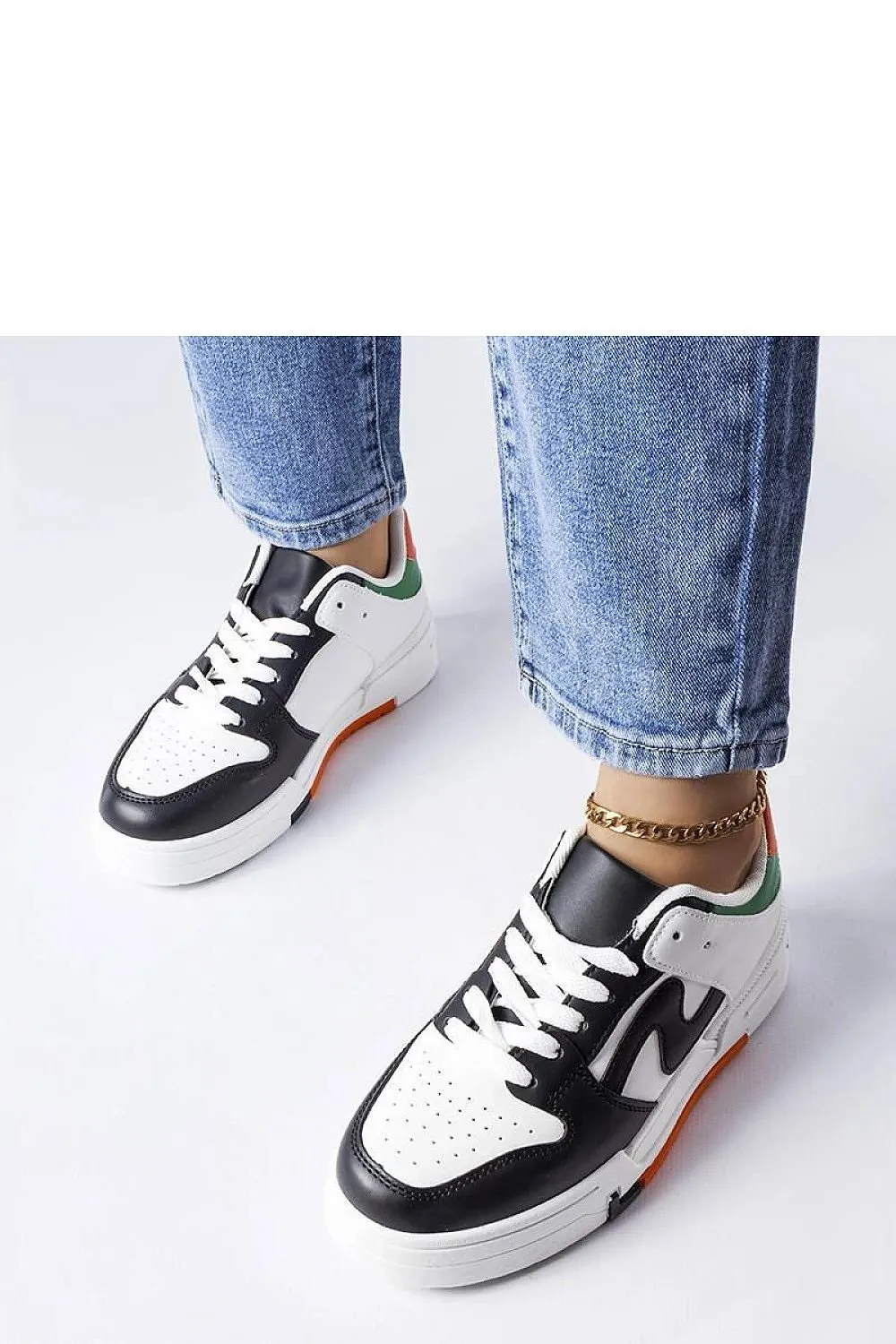 Black and white sneakers with a thicker sole